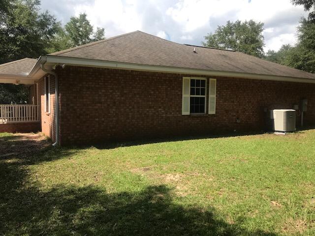 4270 Painter Branch Road Crestview, FL 32539 - Photo 19 of 24 a backyard of a house
