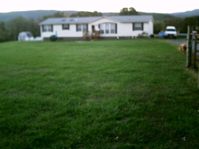 7898 Community Center Road Bridgewater, VA 22812 - Photo 1 of 1 a house view with a garden space
