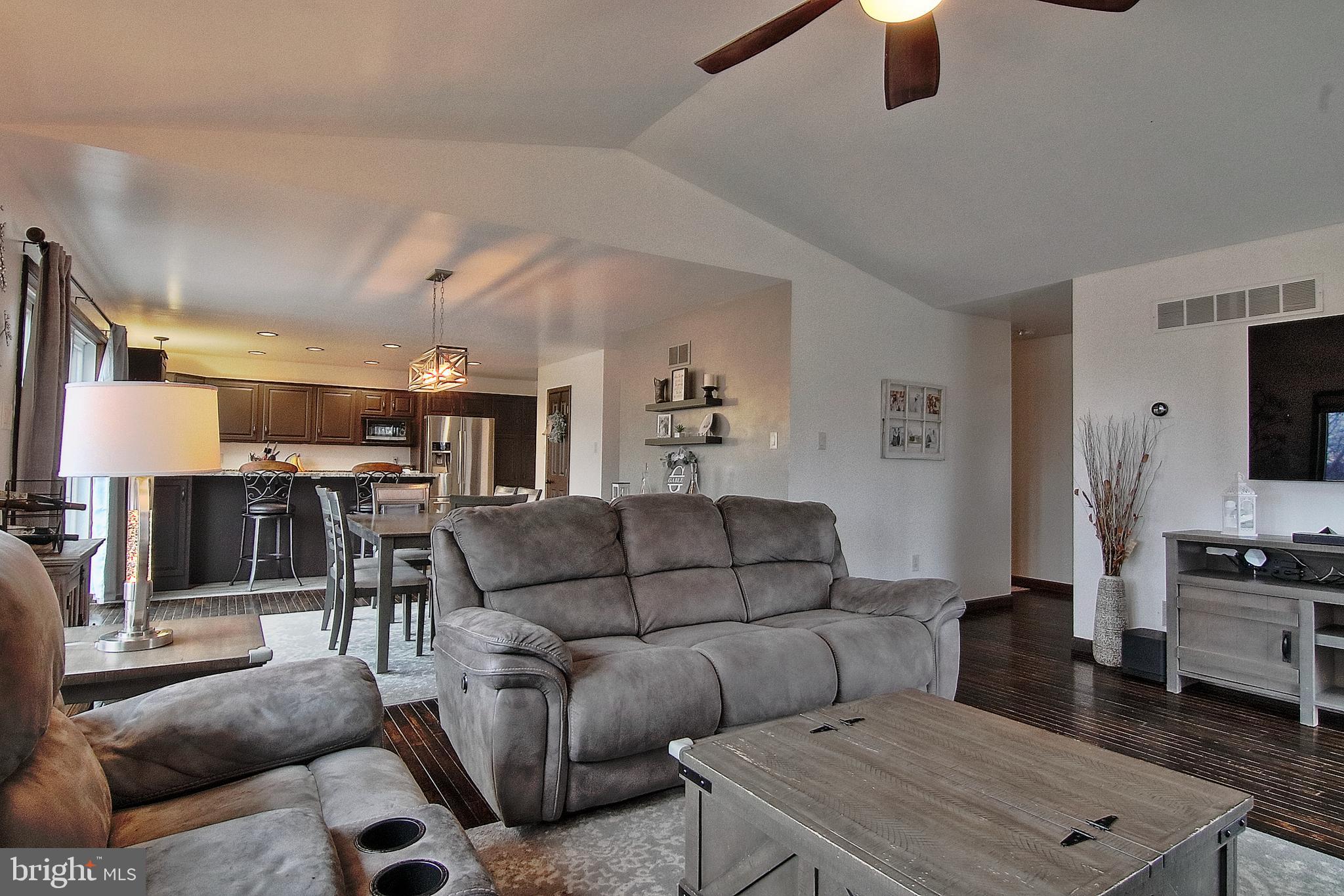 13 Shade Road Oley, PA 19547 - Photo 11 of 48 a living room with furniture and a flat screen tv