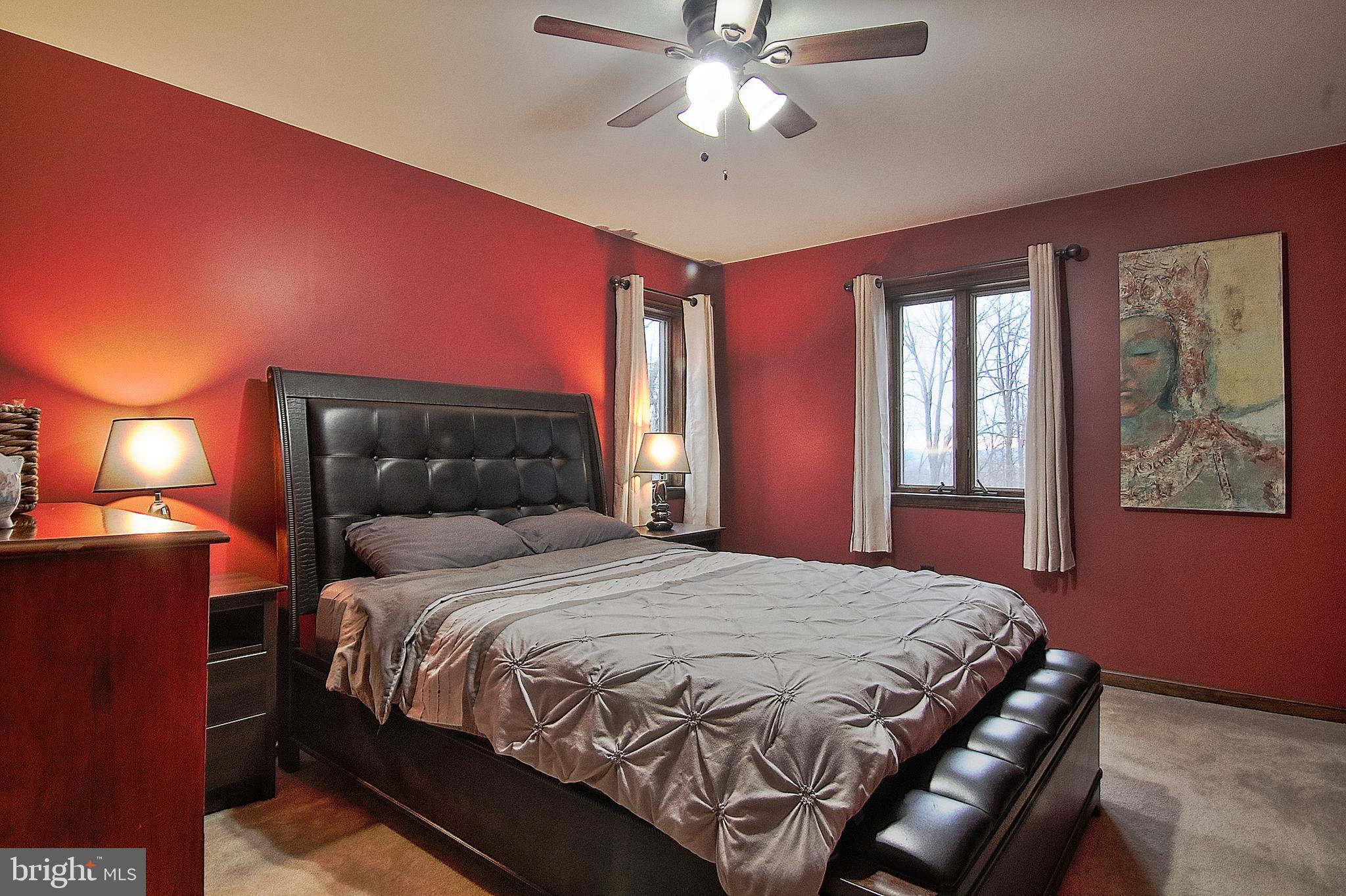 13 Shade Road Oley, PA 19547 - Photo 22 of 48 a bedroom with a bed and window