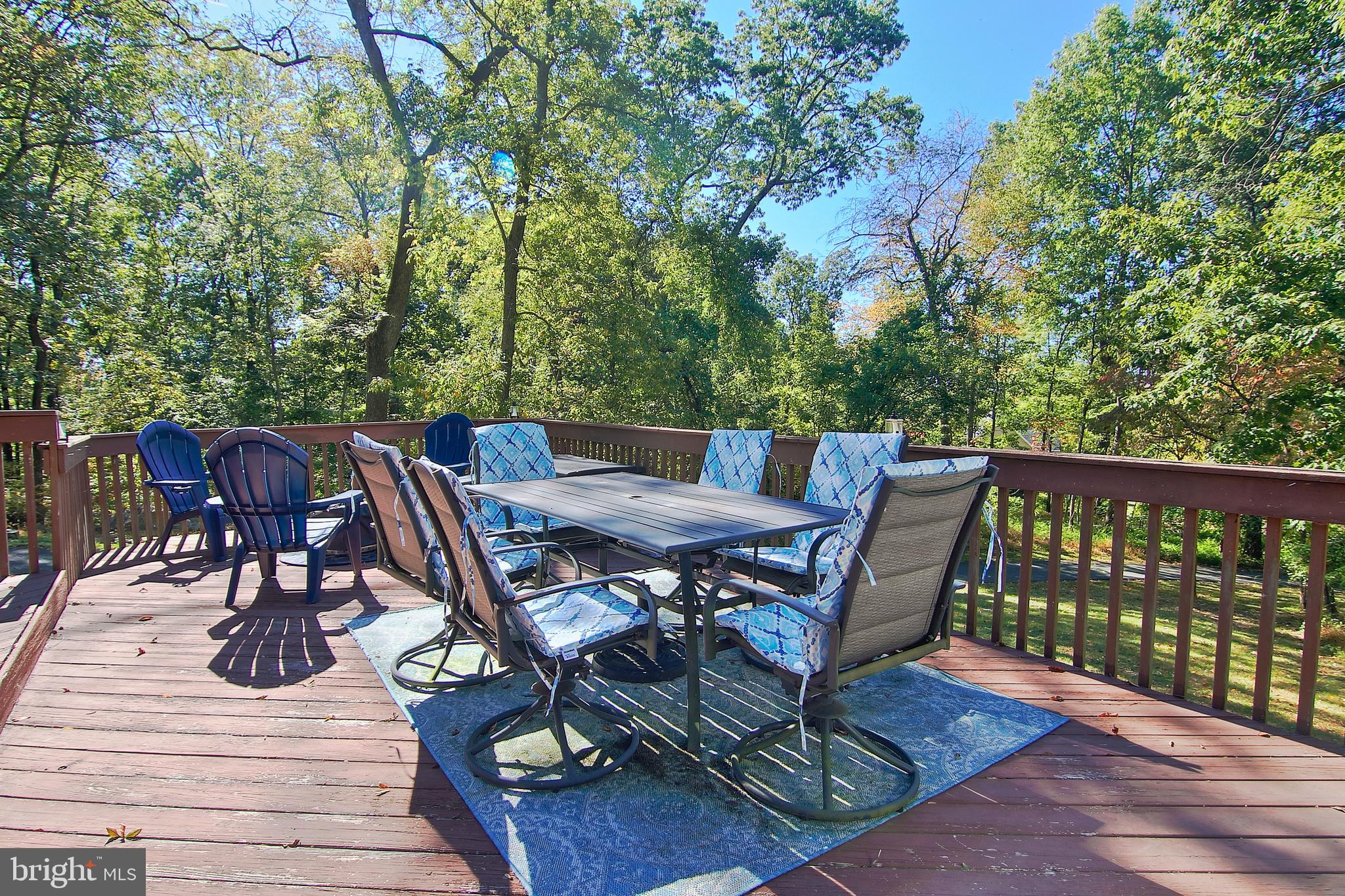 13 Shade Road Oley, PA 19547 - Photo 33 of 48 a view of a chairs and table on the deck