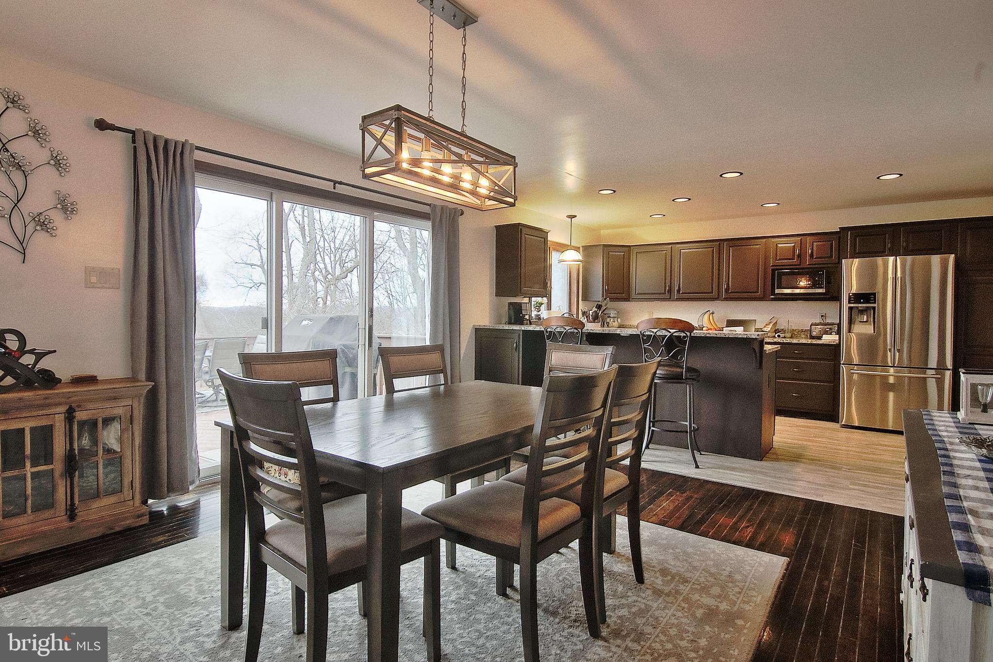 13 Shade Road Oley, PA 19547 - Photo 9 of 48 a view of a dining room with furniture window and outside view
