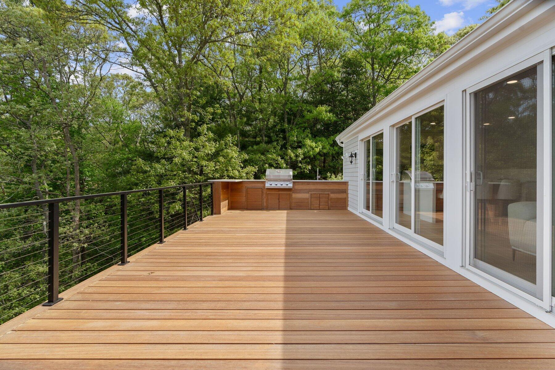 162 Main Street Osterville, MA 02655 - Photo 16 of 50 a view of a house with backyard and deck