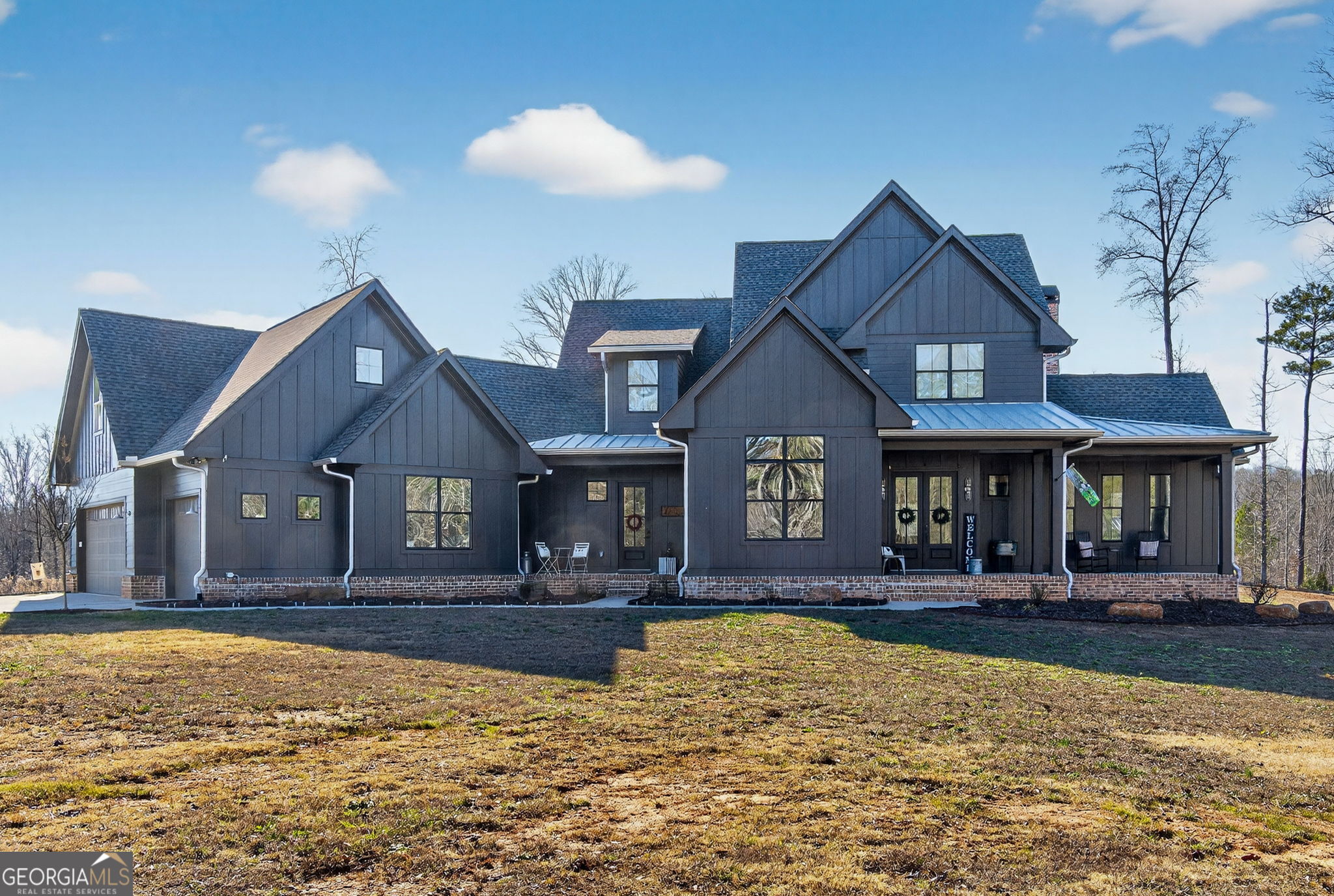 285 Dial Mill Road Oxford, GA 30054 - Photo 1 of 85 a house view with a swimming pool table and chairs