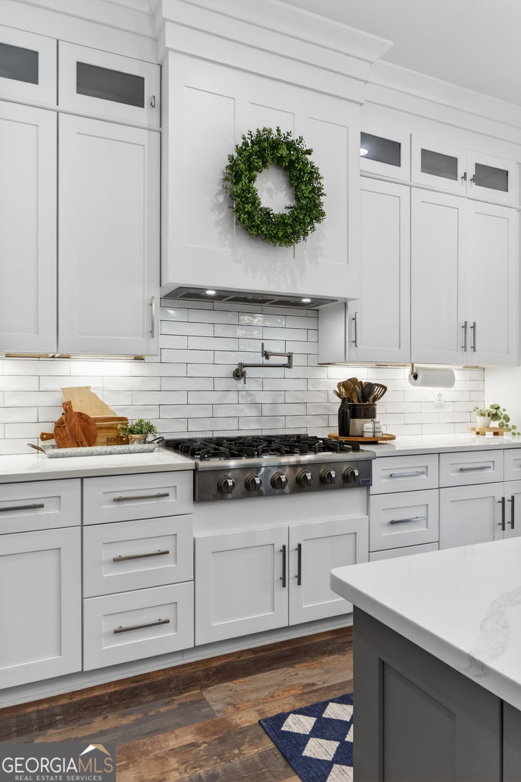 285 Dial Mill Road Oxford, GA 30054 - Photo 21 of 85 a kitchen with stainless steel appliances granite countertop a sink and cabinets