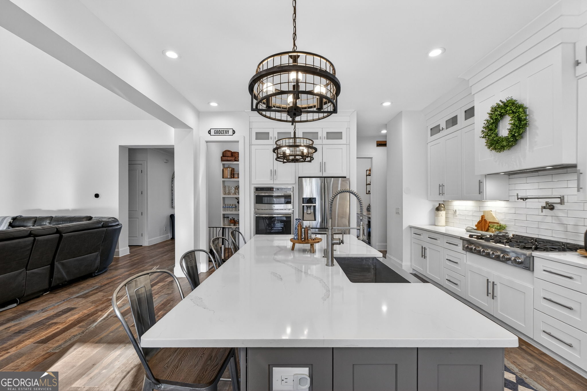 285 Dial Mill Road Oxford, GA 30054 - Photo 25 of 85 a kitchen with stainless steel appliances a stove a sink dishwasher and a refrigerator with wooden floor