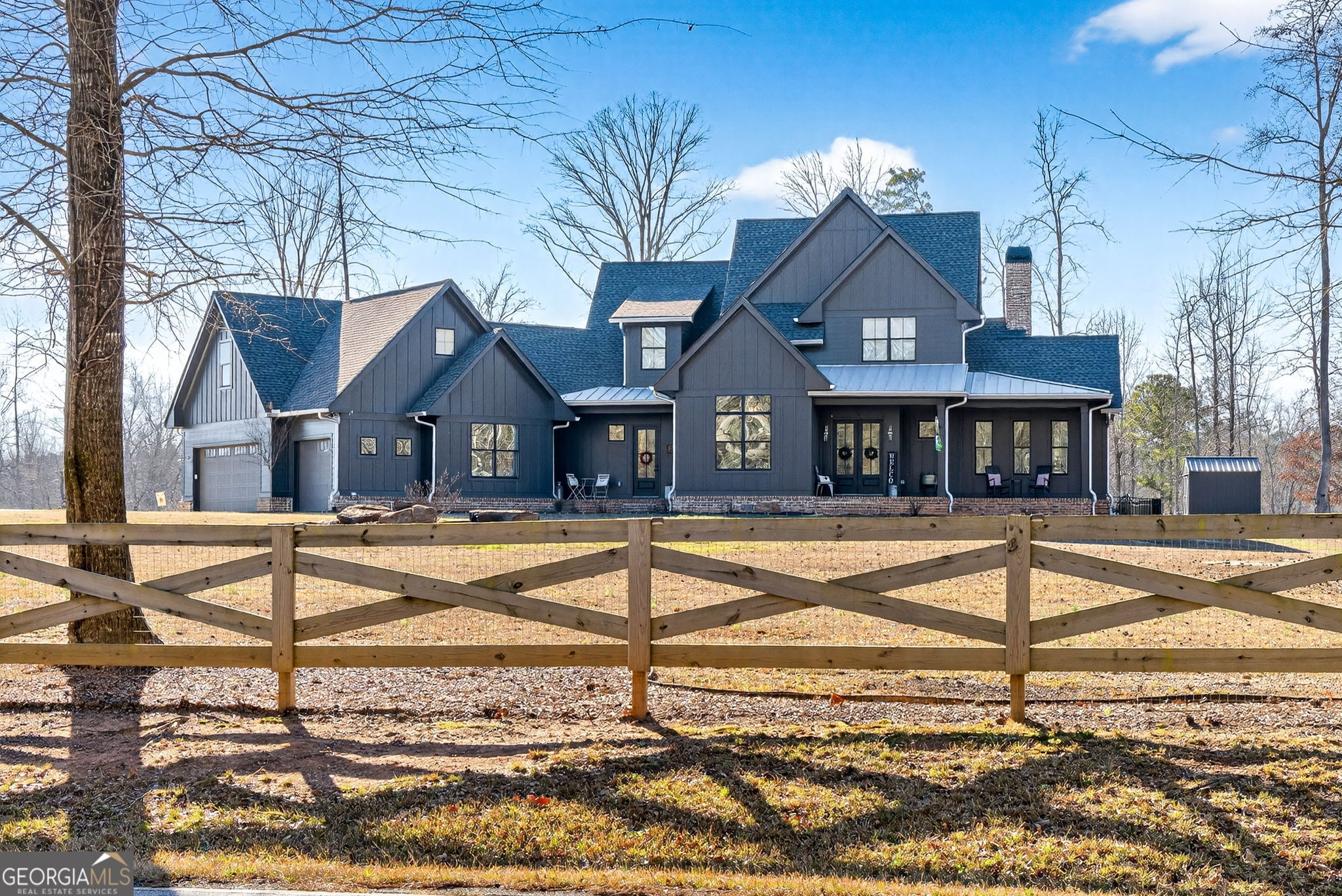 285 Dial Mill Road Oxford, GA 30054 - Photo 4 of 85 a front view of a house with swimming pool