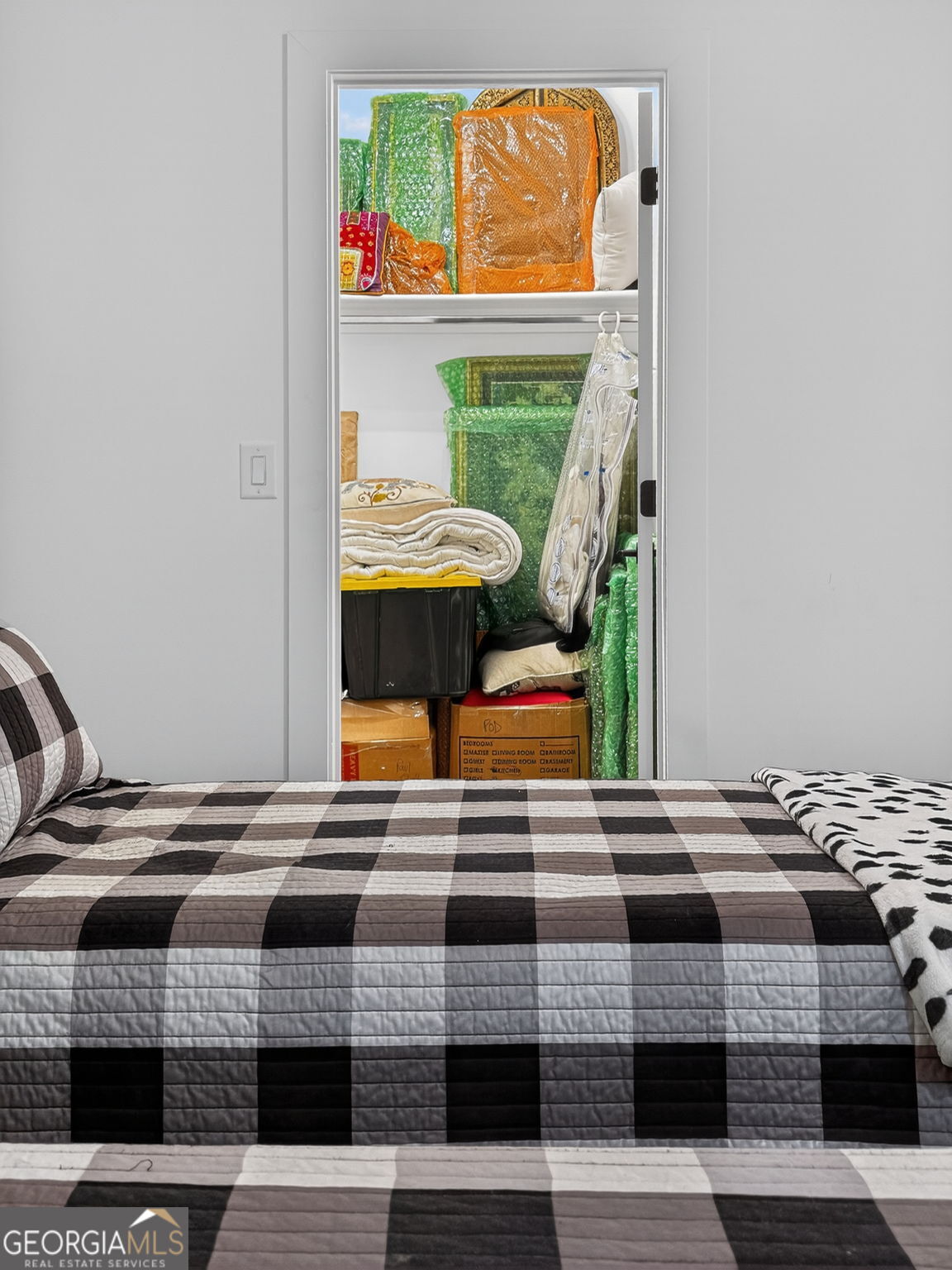 285 Dial Mill Road Oxford, GA 30054 - Photo 55 of 85 a view of walk in closet with clothes and shoes