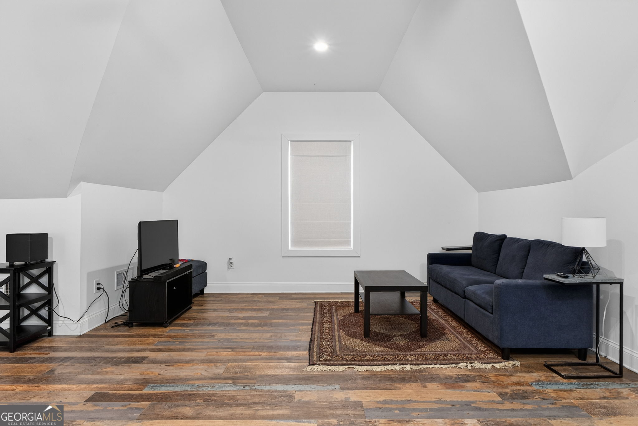 285 Dial Mill Road Oxford, GA 30054 - Photo 61 of 85 a living room with furniture and a flat screen tv