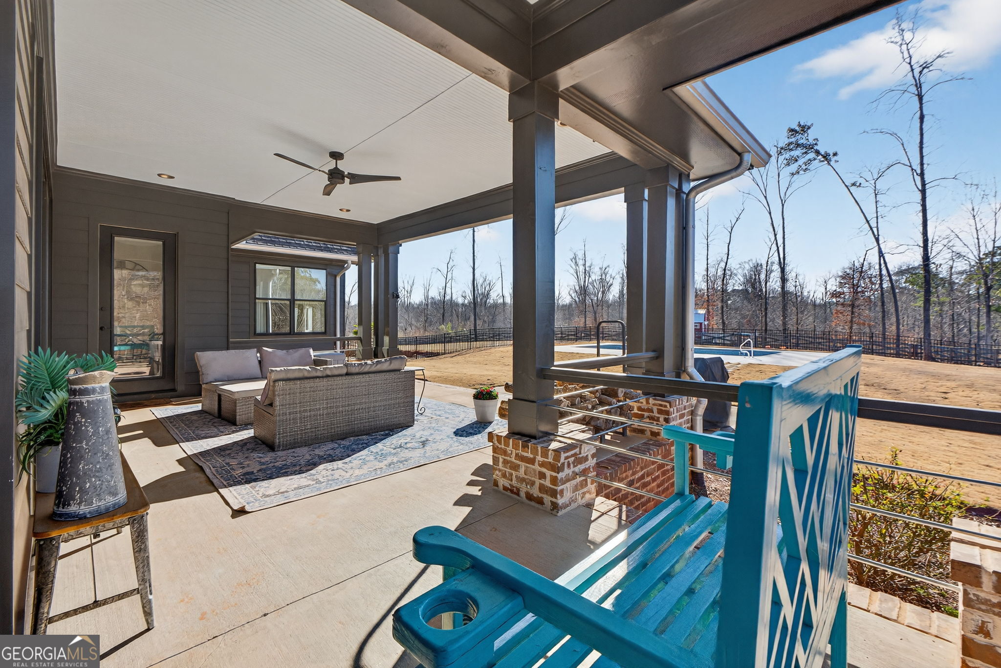 285 Dial Mill Road Oxford, GA 30054 - Photo 68 of 85 a living room with furniture and a floor to ceiling window