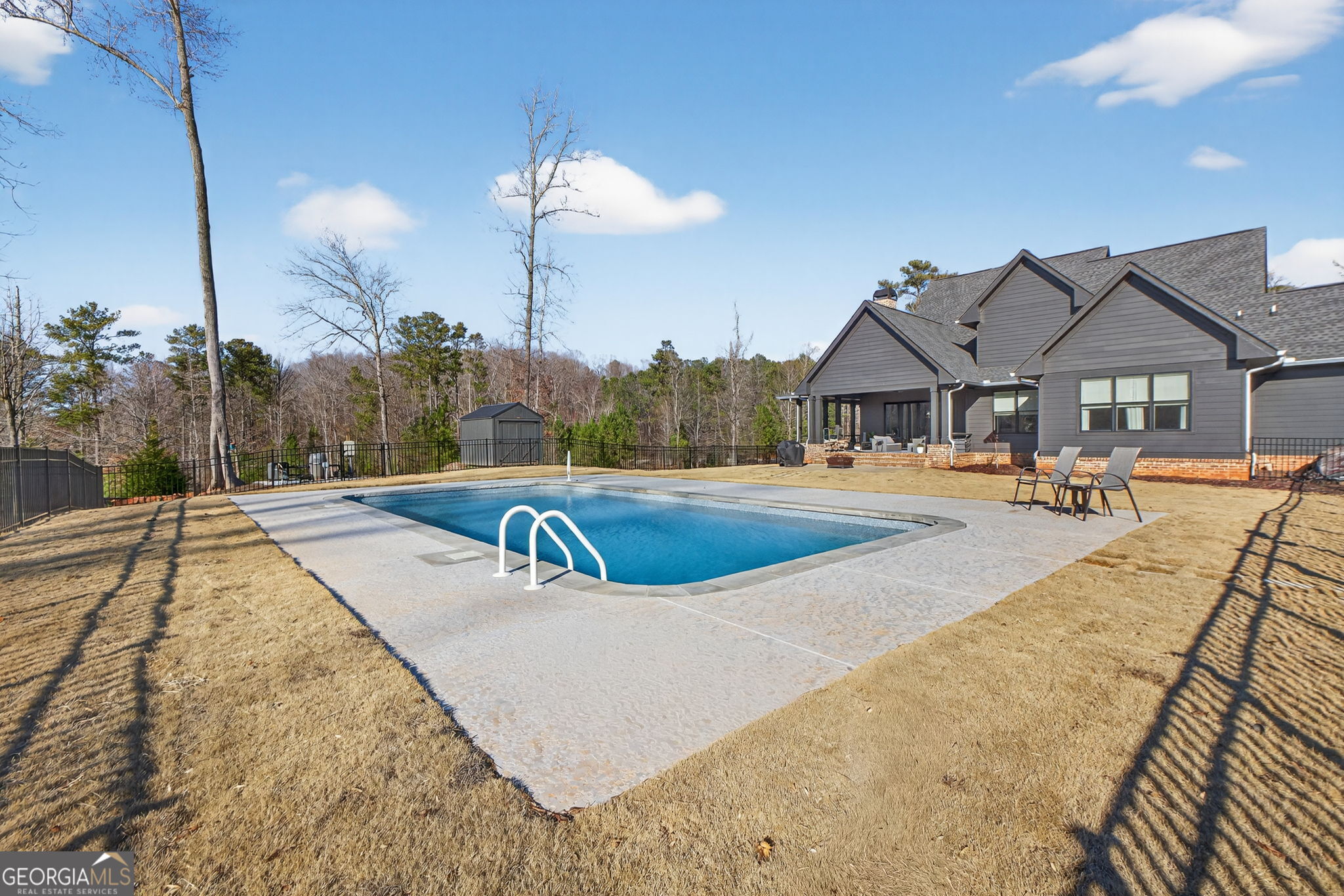 285 Dial Mill Road Oxford, GA 30054 - Photo 73 of 85 a view of a swimming pool with a patio