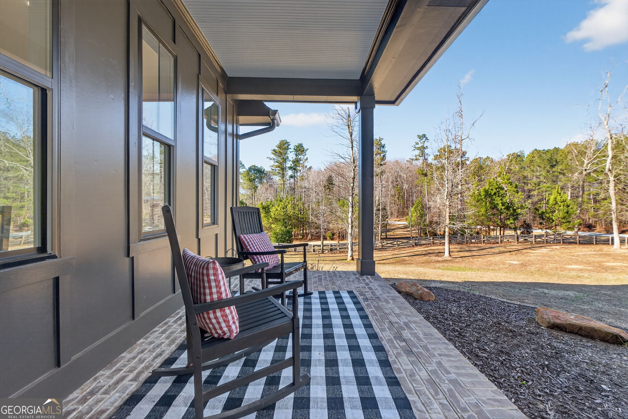 285 Dial Mill Road Oxford, GA 30054 - Photo 8 of 85 a view of a porch with furniture and garden