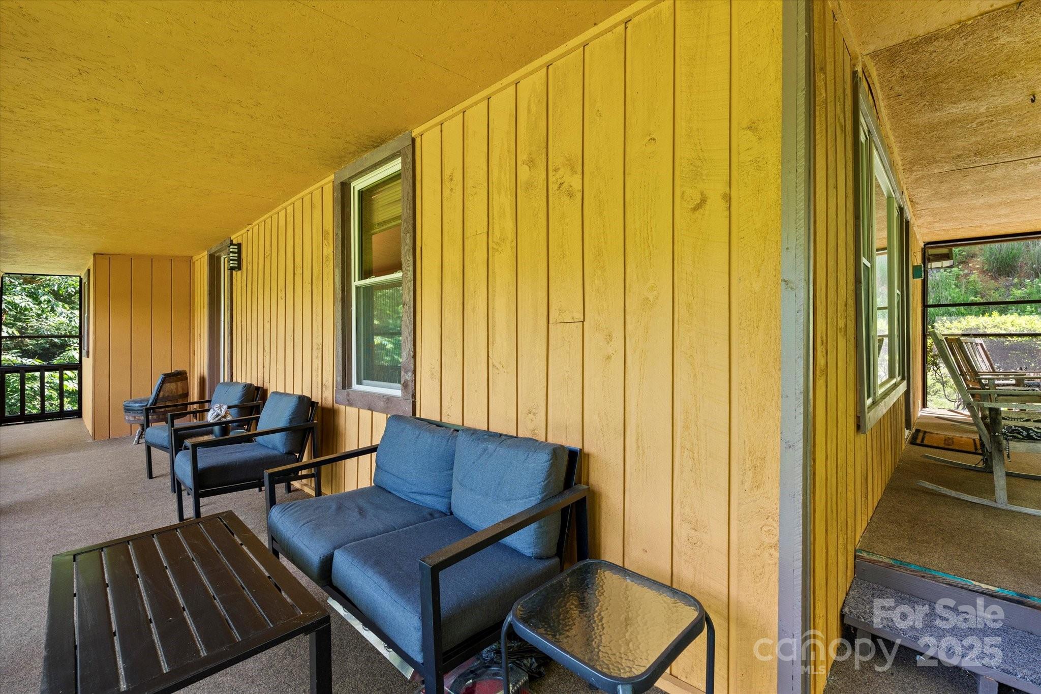 139 Ivy Ridge Church Road Mars Hill, NC 28754 - Photo 4 of 37 a view of a bedroom with furniture and a window