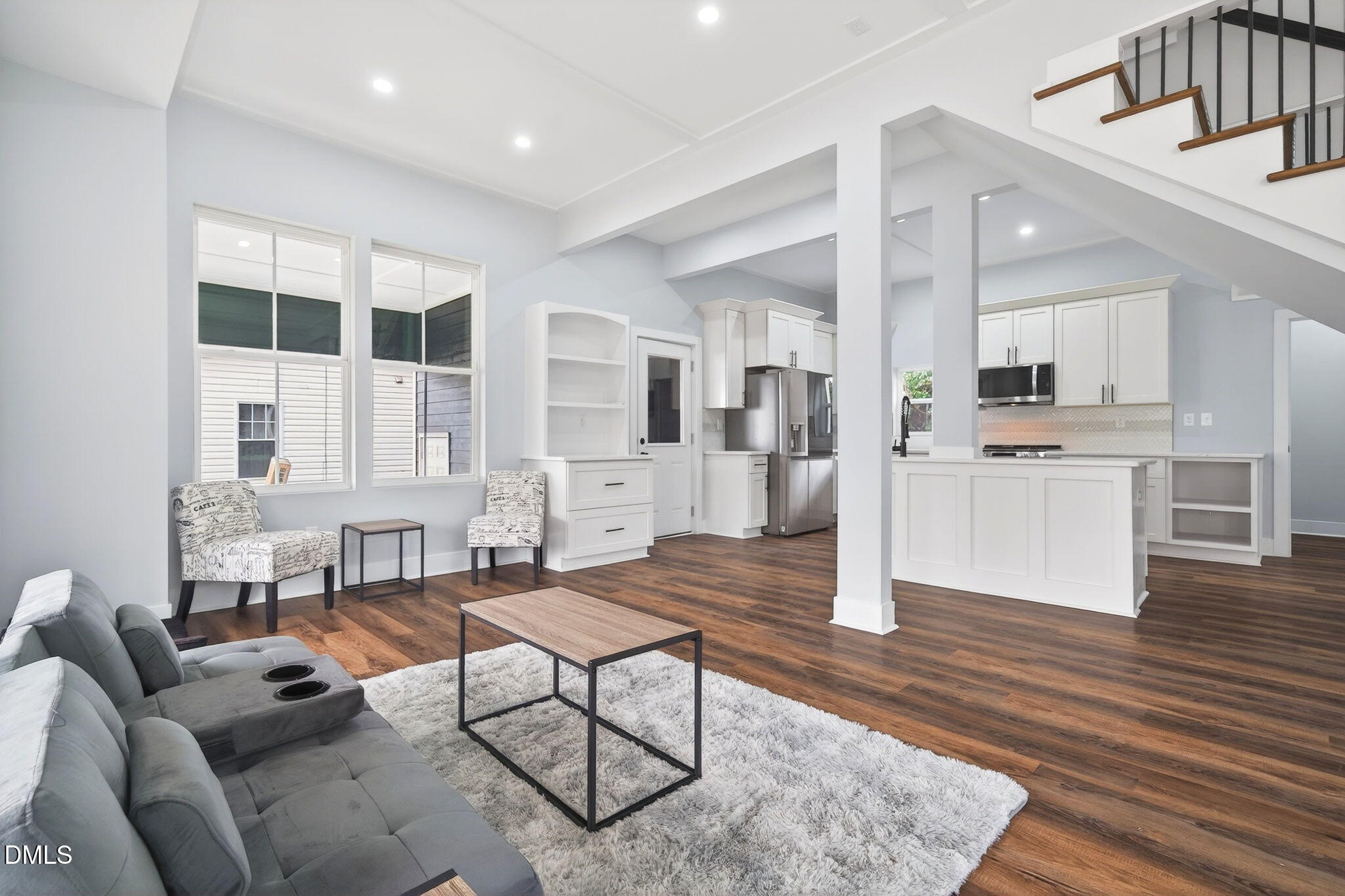 221 East Lee Street Raleigh, NC 27601 - Photo 10 of 41 a living room with furniture and view of kitchen