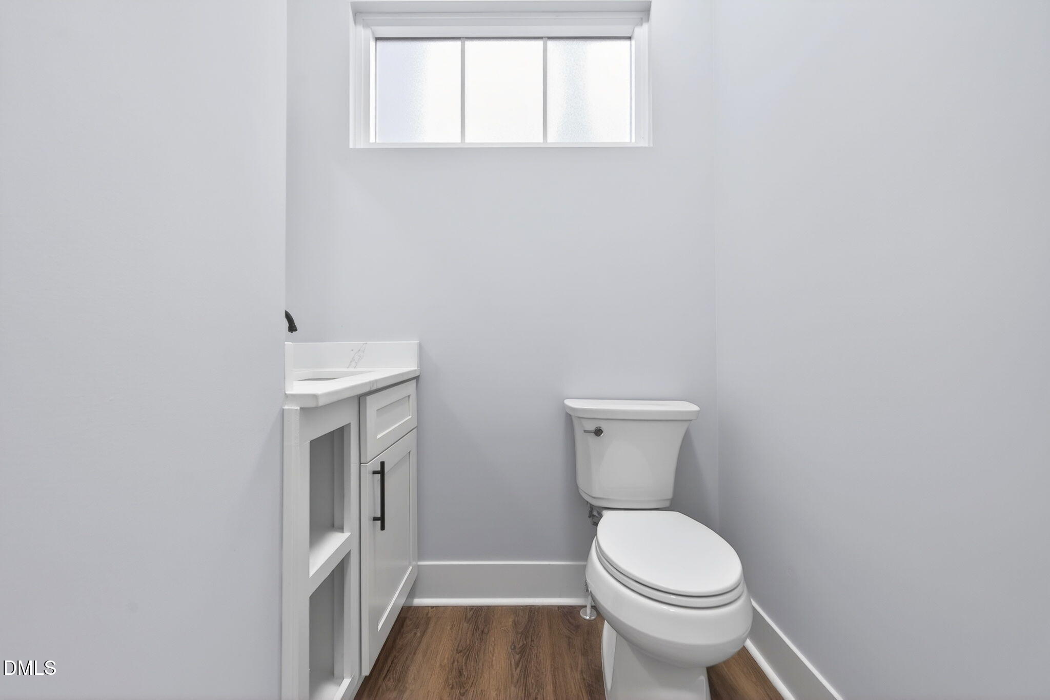 221 East Lee Street Raleigh, NC 27601 - Photo 26 of 41 a bathroom with a toilet and a sink