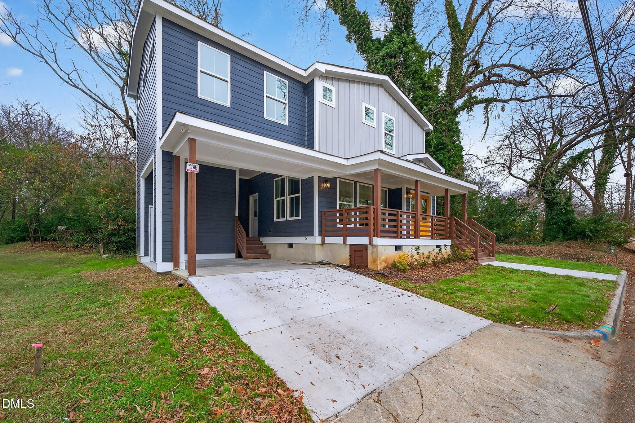 221 East Lee Street Raleigh, NC 27601 - Photo 3 of 41 a view of a house with a yard and large tree