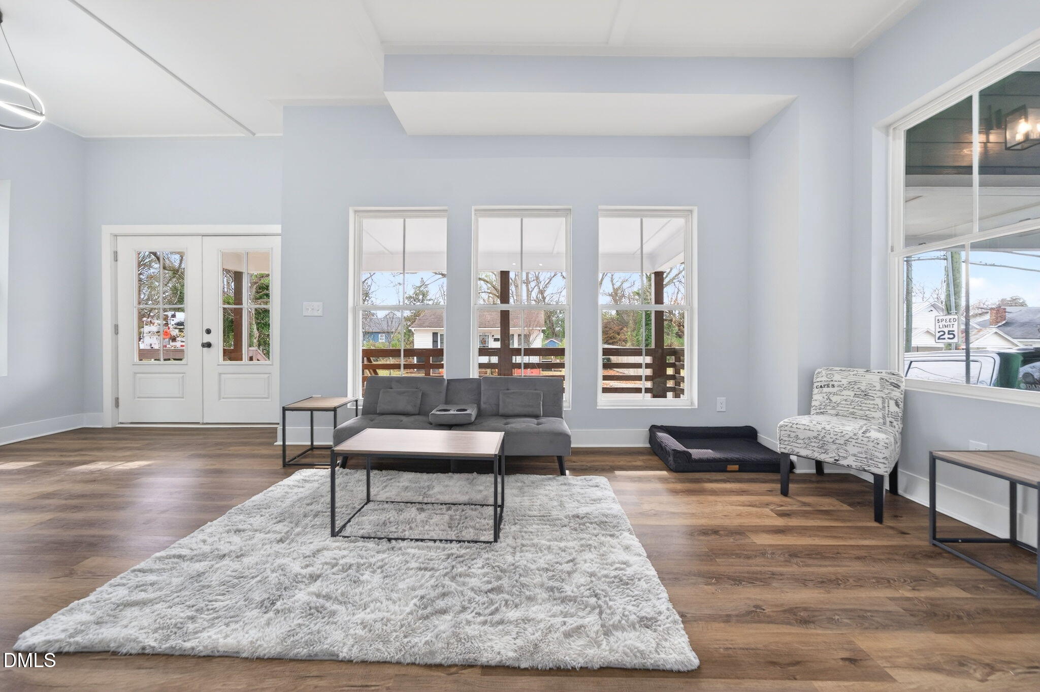 221 East Lee Street Raleigh, NC 27601 - Photo 7 of 41 a living room with furniture and a large window