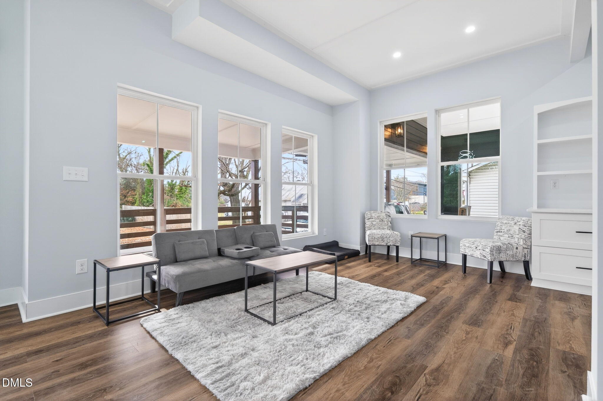 221 East Lee Street Raleigh, NC 27601 - Photo 8 of 41 a living room with furniture and a window