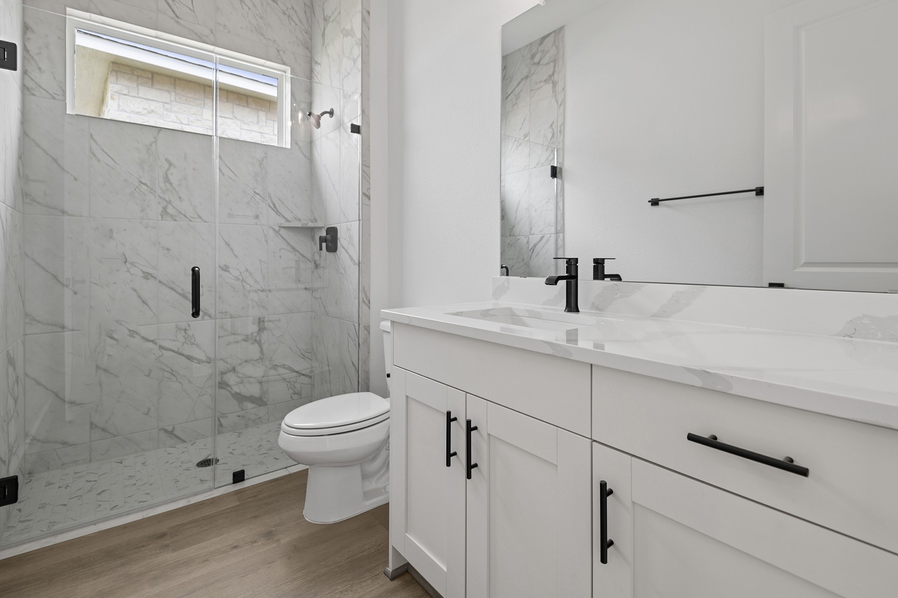 1911 Drover Lane Rosenberg, TX 77471 - Photo 22 of 22 a bathroom with a sink a toilet and shower