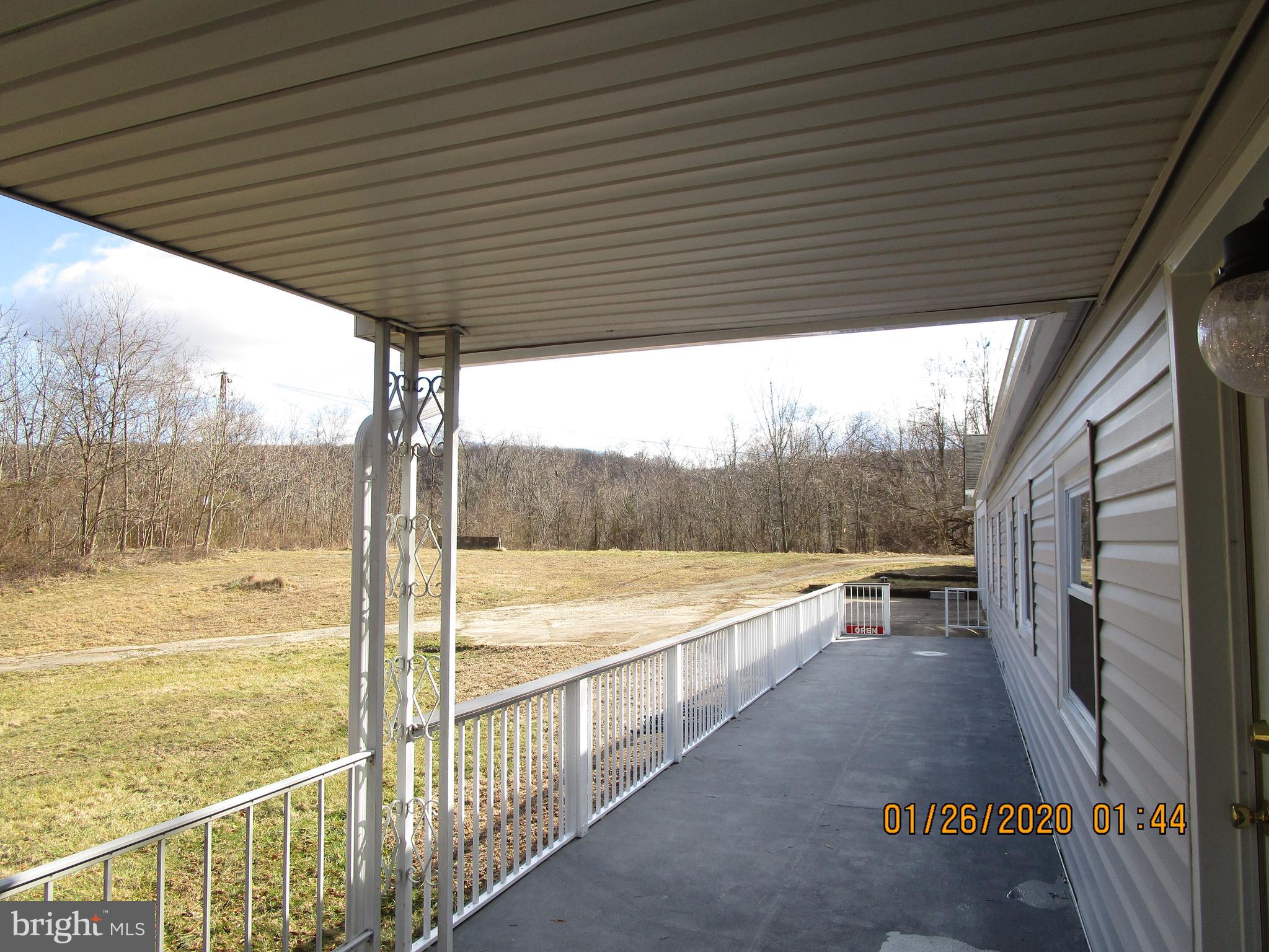 1631 Dooley Road Whiteford, MD 21160 - Photo 43 of 50 Front porch Partially covered