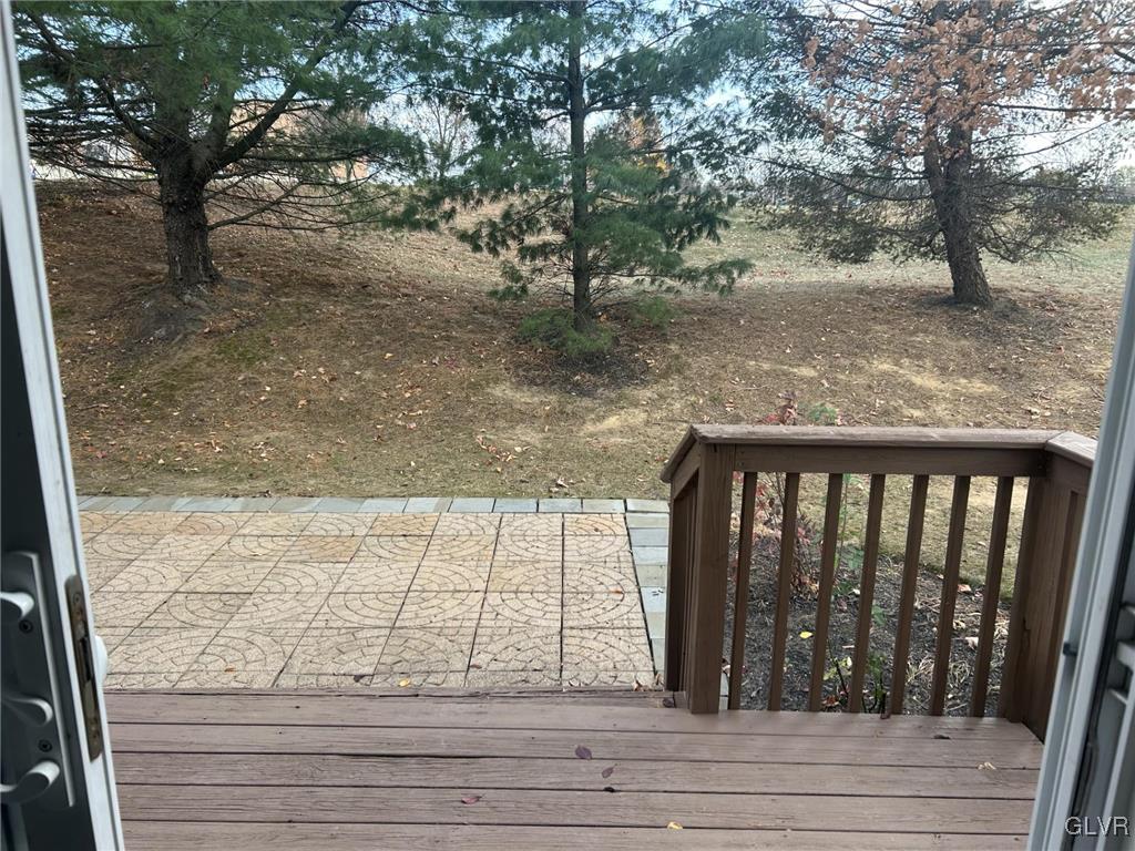 4302 Creek Road Allentown, PA 18104 - Photo 3 of 18 a view of wooden floor and a bench