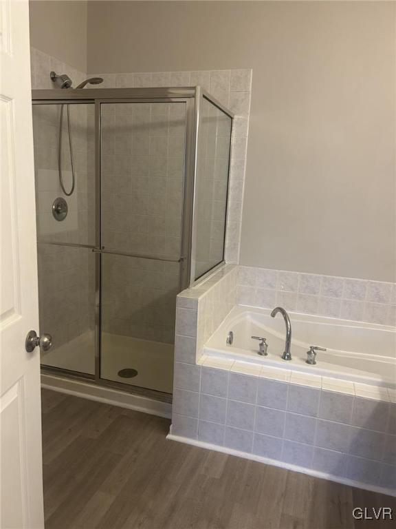 4302 Creek Road Allentown, PA 18104 - Photo 10 of 18 a bathroom with a tub and a shower