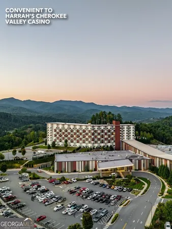 a view of a lake with a city from a balcony