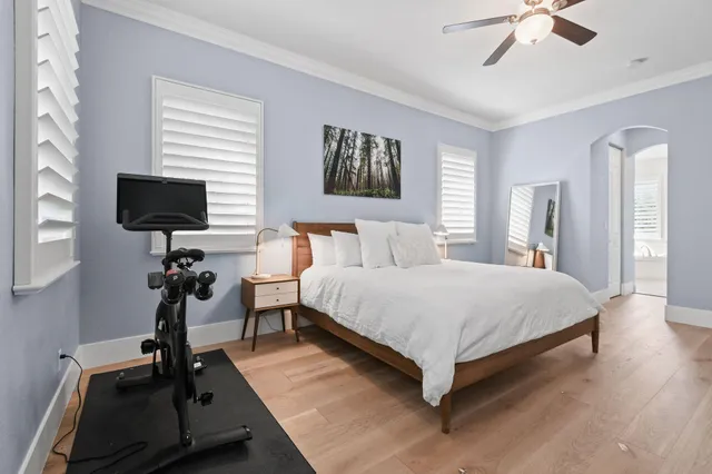 a bedroom with a bed and a table in it