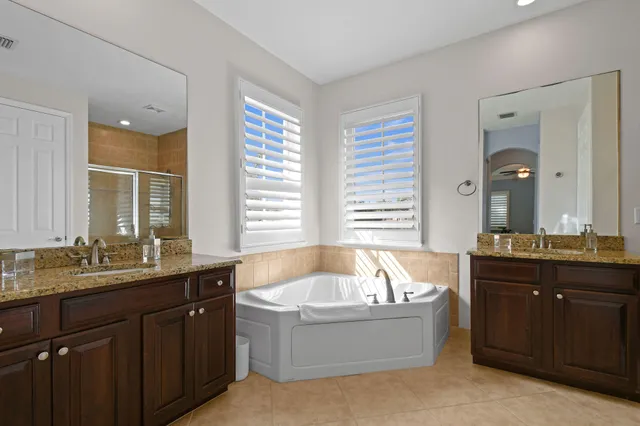 a view of a yard with palm trees