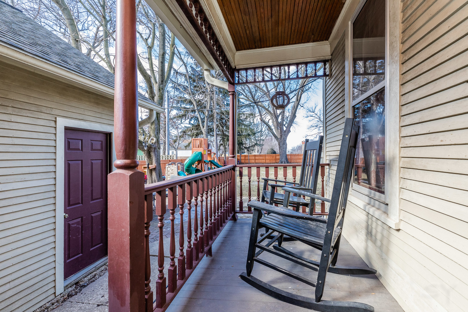 121 Mason Court Sycamore, IL 60178 - Photo 38 of 38 a view of a porch with wooden fence and floor