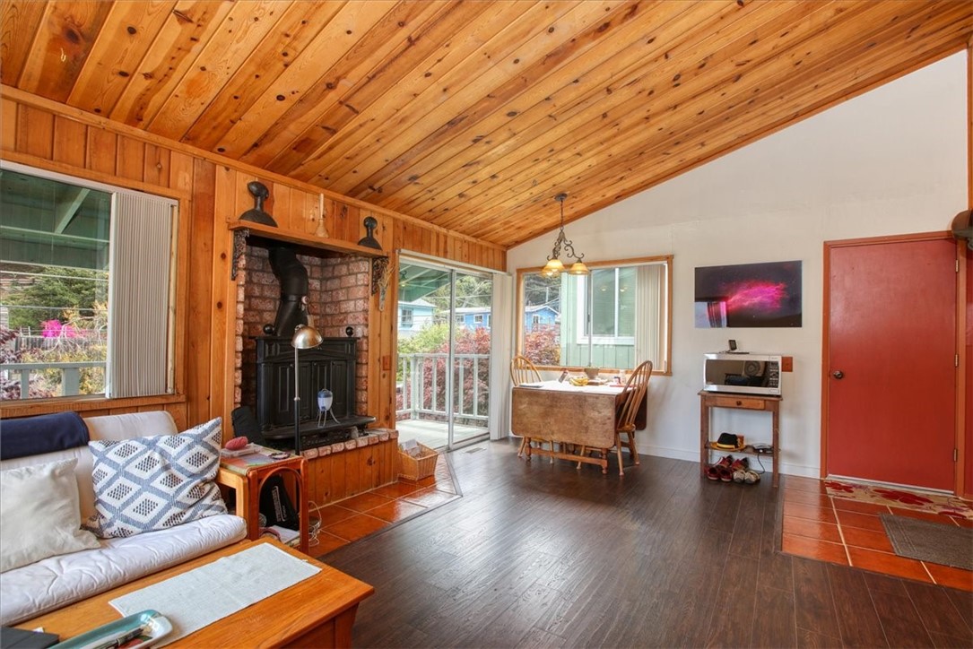 910 Sheffield Street Cambria, CA 93428 - Photo 3 of 29 a living room with furniture and a wooden floor