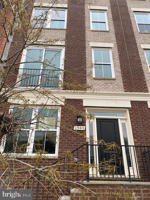 1949 Roland Clarke Place, Unit 32 Reston, VA 20191 - Photo 1 of 12 TOWNHOME WITH ELEVATOR CLOSET.