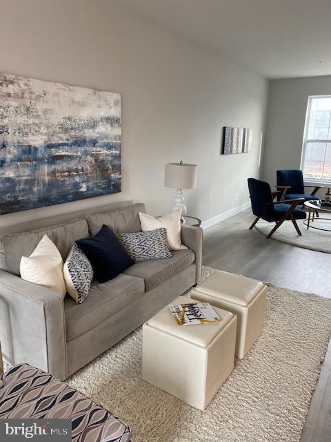 1949 Roland Clarke Place, Unit 32 Reston, VA 20191 - Photo 8 of 12 FAMILY ROOM