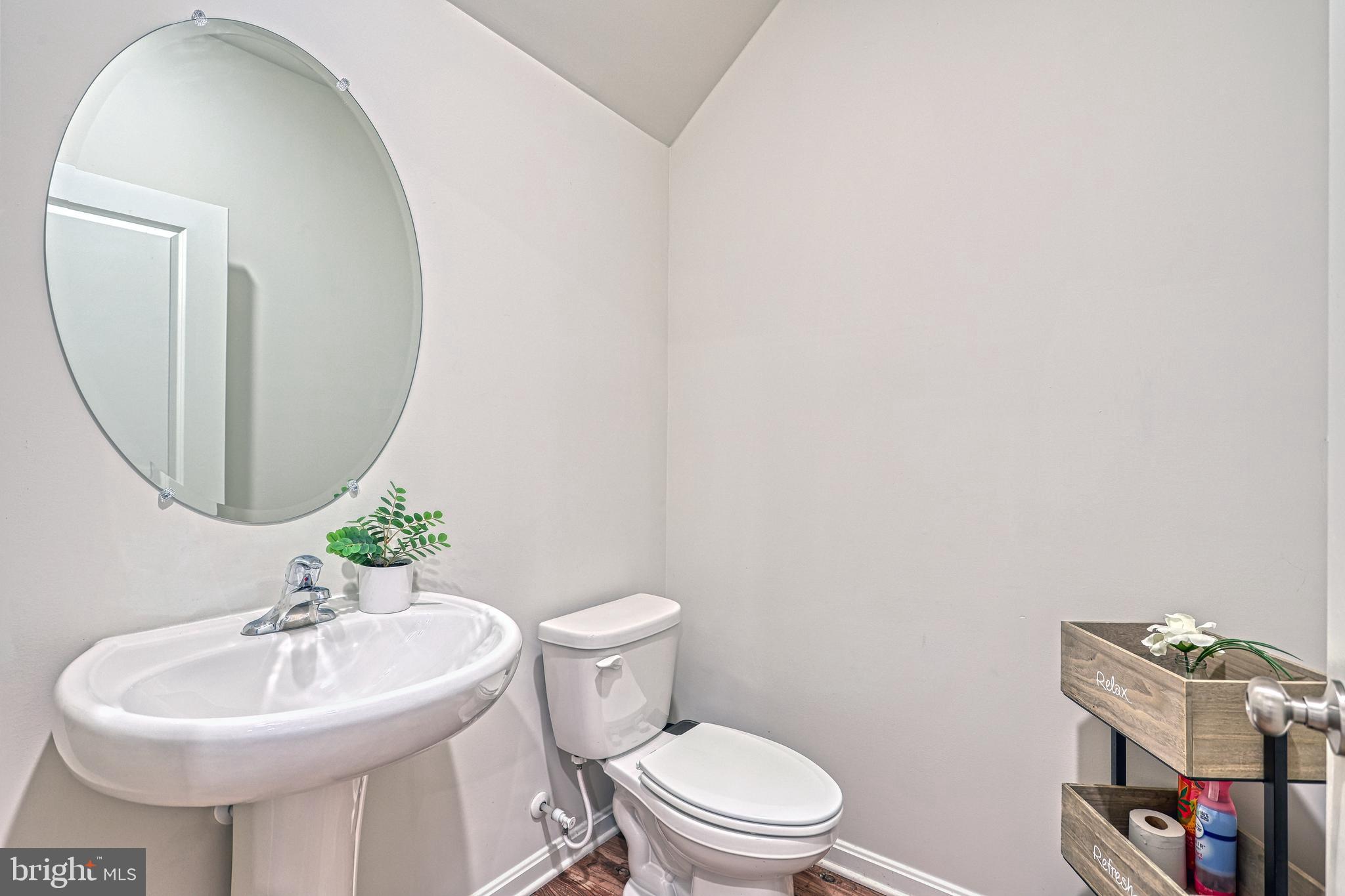 260 Maple Run Drive York, PA 17404 - Photo 13 of 31 a bathroom with a sink a mirror and a toilet