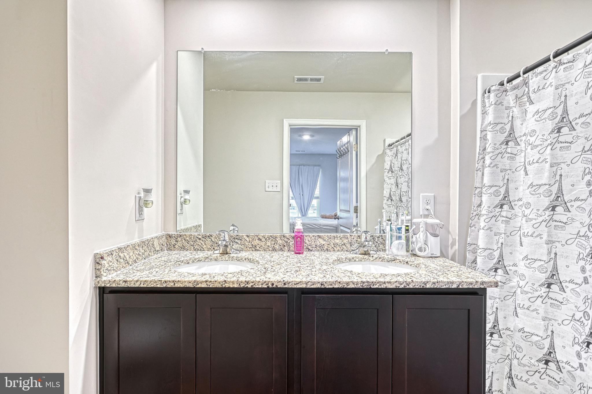 260 Maple Run Drive York, PA 17404 - Photo 18 of 31 a bathroom with a granite countertop sink and a mirror