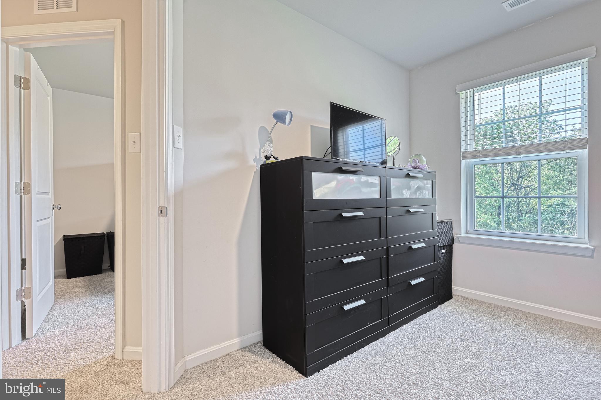 260 Maple Run Drive York, PA 17404 - Photo 22 of 31 a room with a dresser and a window