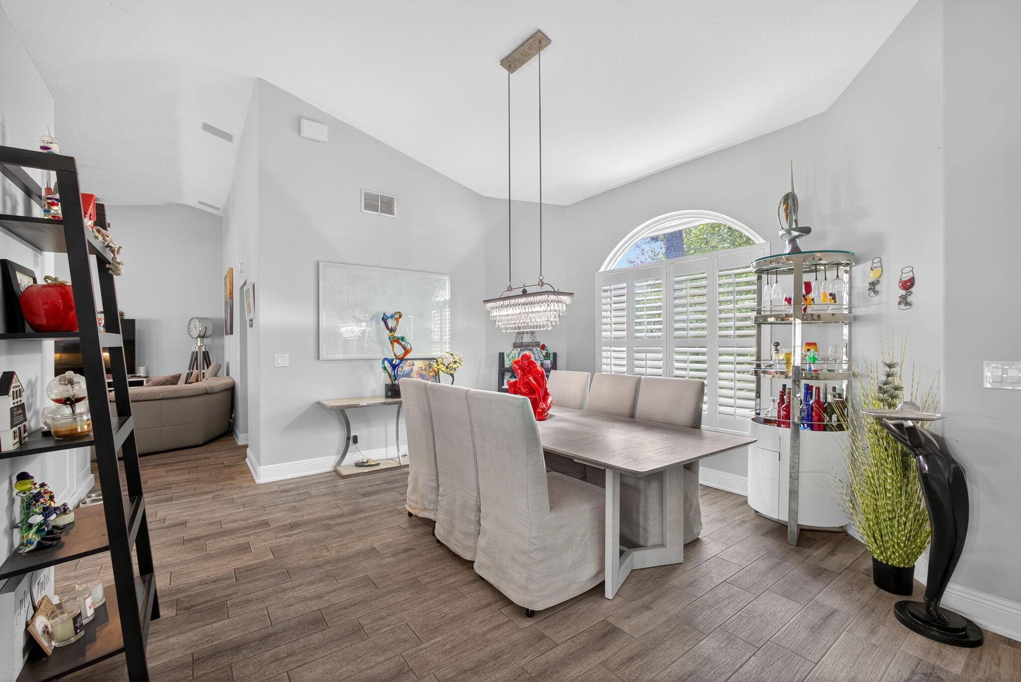 13033 160th Road North Jupiter, FL 33478 - Photo 11 of 79 a living room with furniture and a wooden floor
