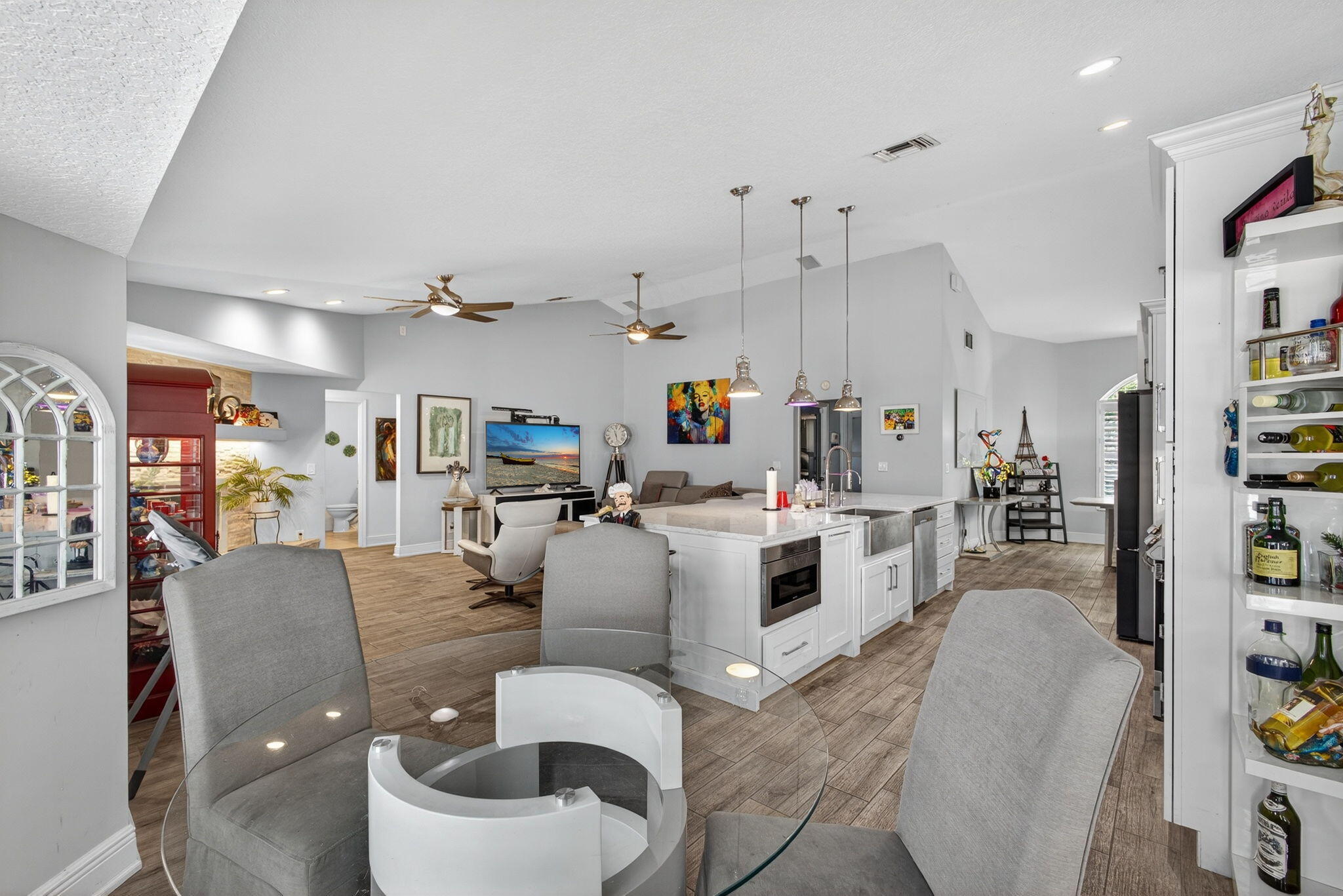 13033 160th Road North Jupiter, FL 33478 - Photo 21 of 79 a living room with furniture and a flat screen tv