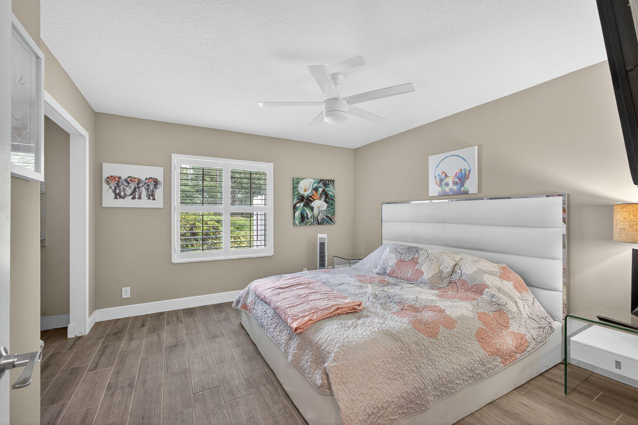 13033 160th Road North Jupiter, FL 33478 - Photo 39 of 79 a bedroom with a bed and a window