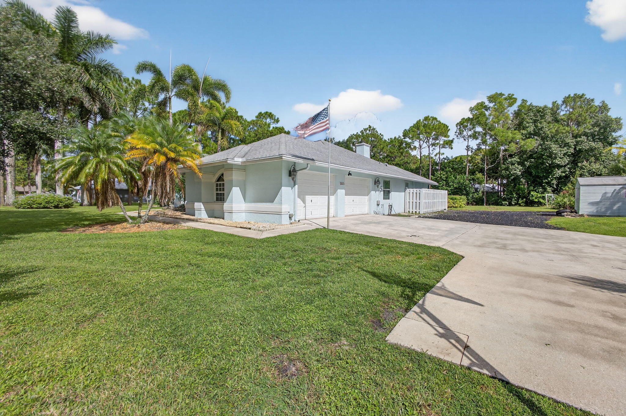 13033 160th Road North Jupiter, FL 33478 - Photo 4 of 79 Main Driveway and 2.5 Car Garage