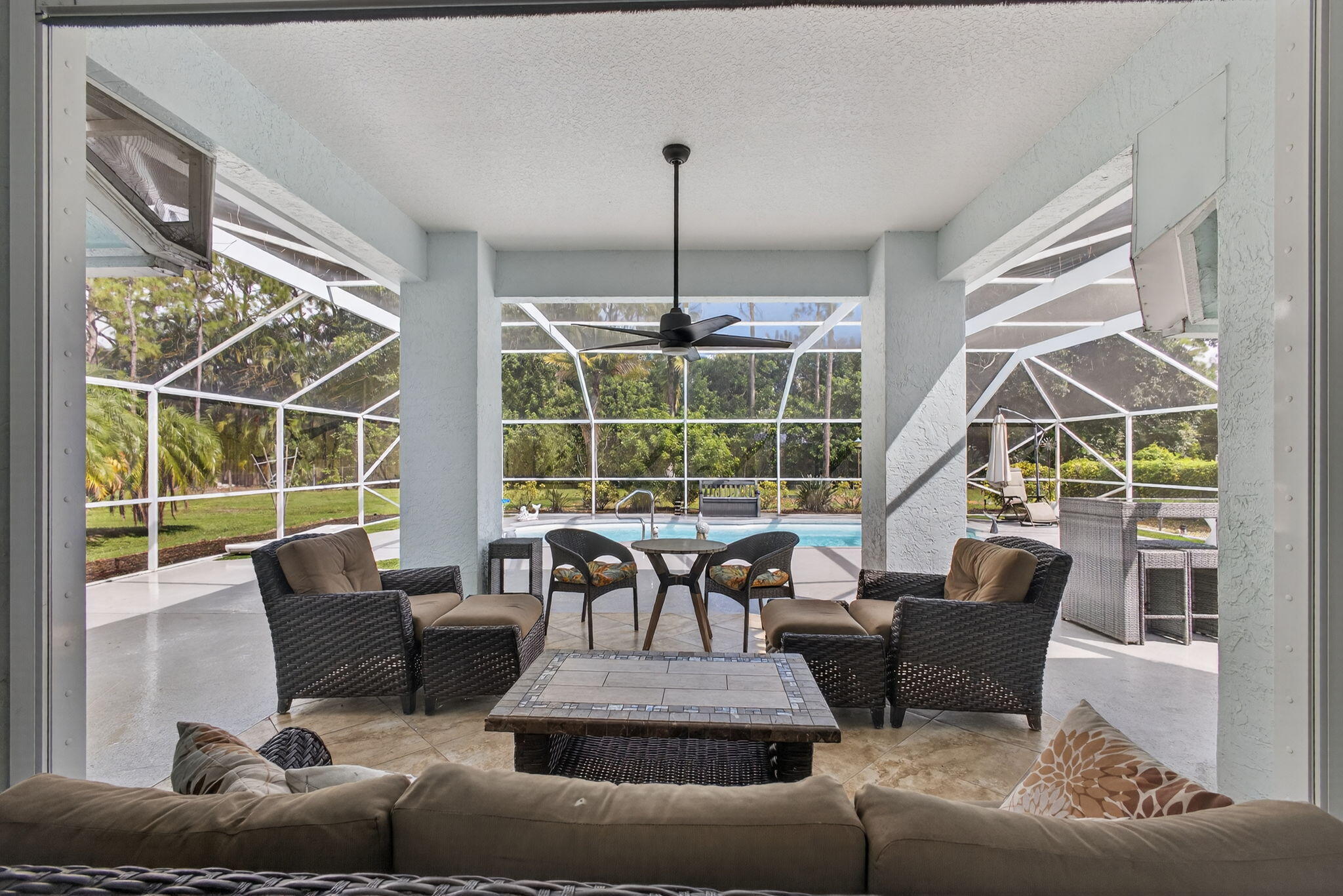 13033 160th Road North Jupiter, FL 33478 - Photo 41 of 79 a living room with furniture and a window