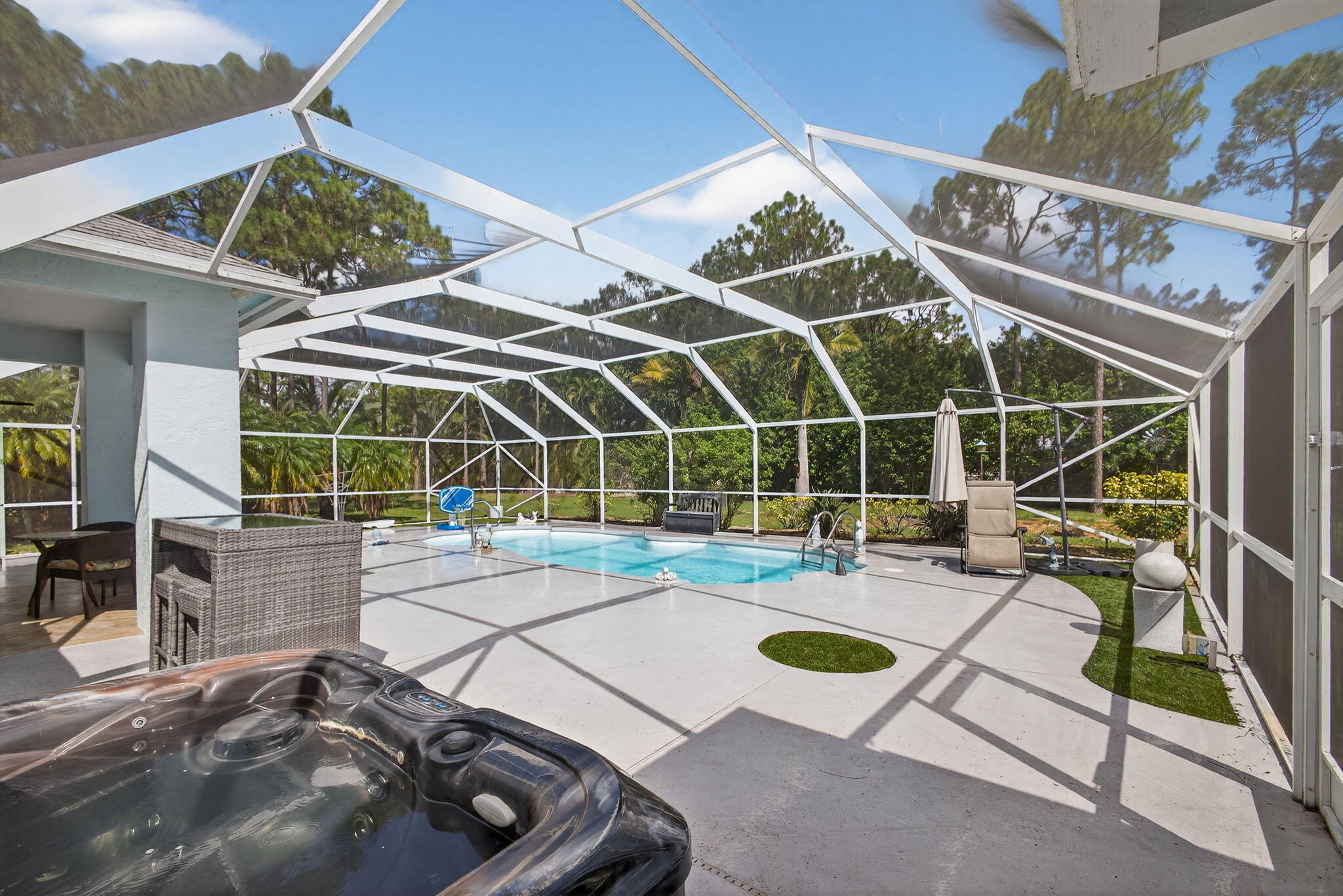 13033 160th Road North Jupiter, FL 33478 - Photo 44 of 79 a view of a chairs and table in the patio