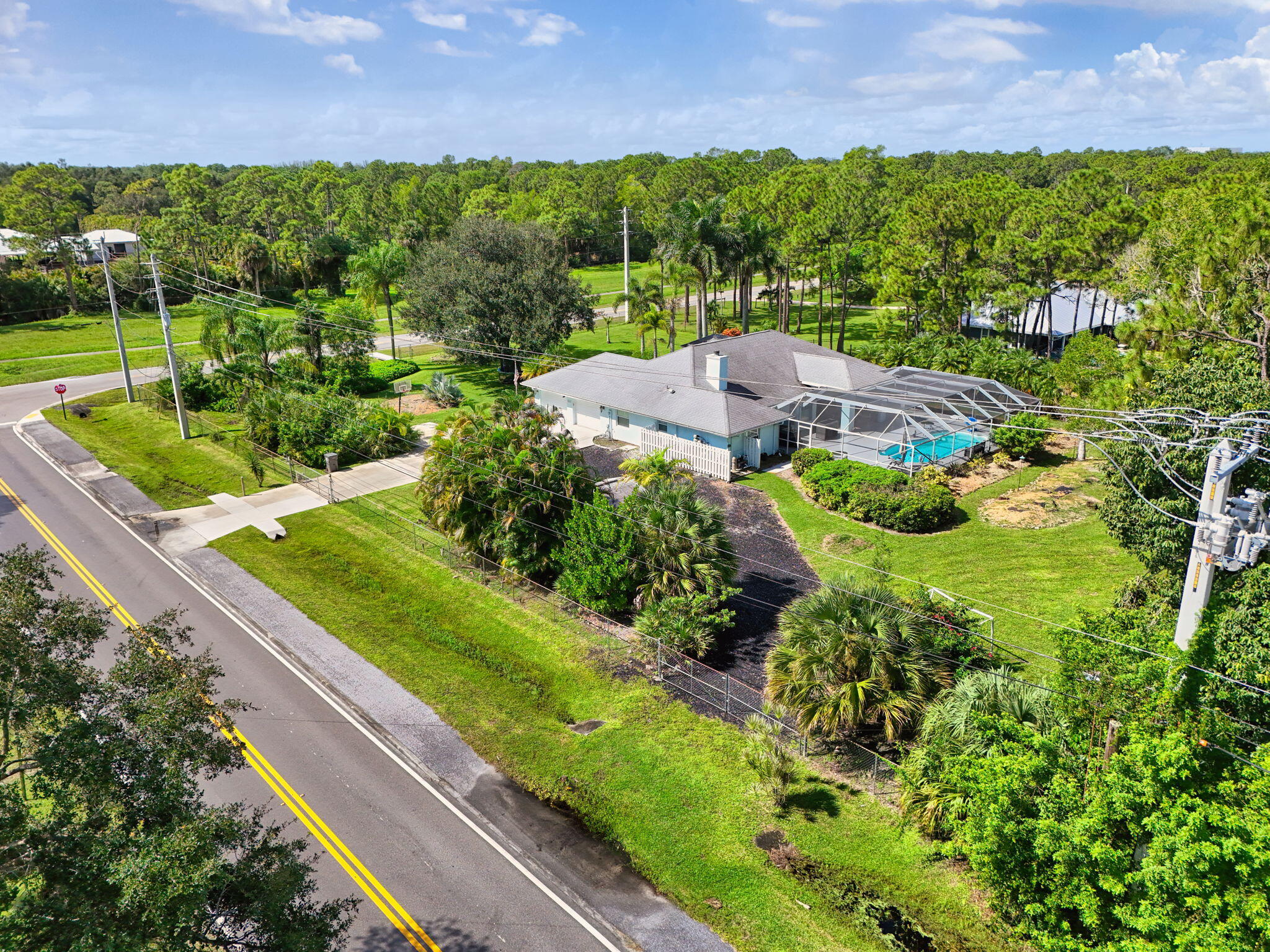 13033 160th Road North Jupiter, FL 33478 - Photo 67 of 79 a view of a garden with an outdoor space