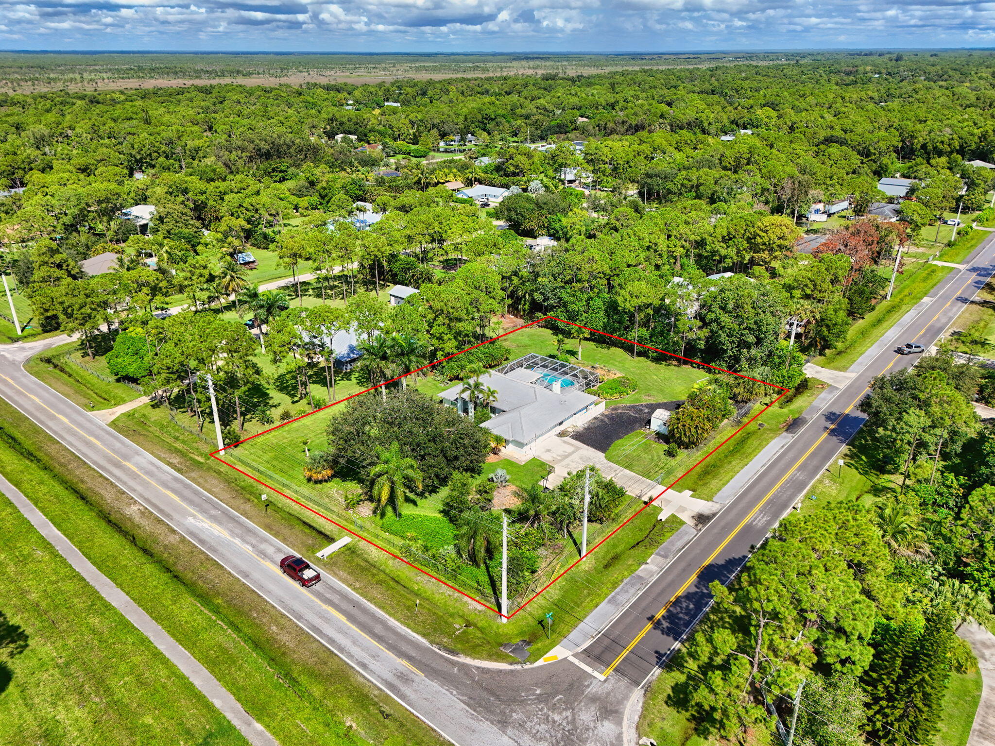 13033 160th Road North Jupiter, FL 33478 - Photo 73 of 79 a view of a garden with an outdoor space