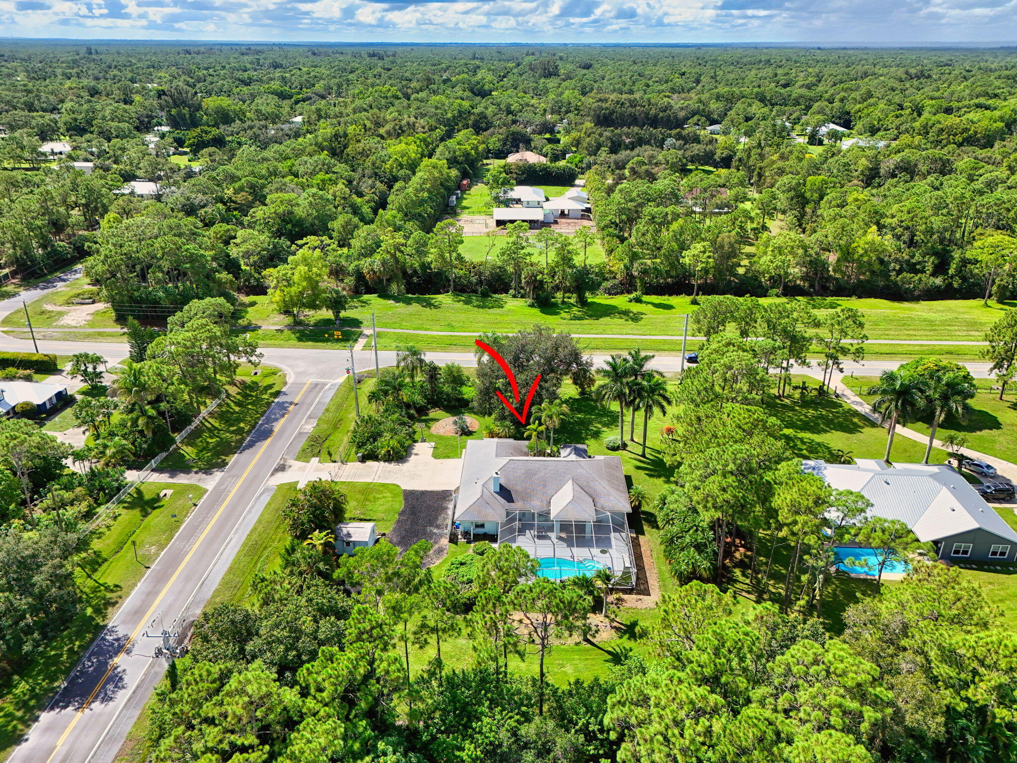 13033 160th Road North Jupiter, FL 33478 - Photo 76 of 79 a view of a garden with an outdoor space