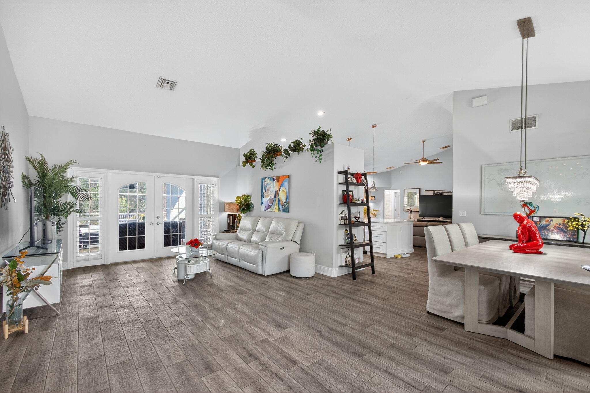 13033 160th Road North Jupiter, FL 33478 - Photo 8 of 79 a living room with furniture and a fireplace