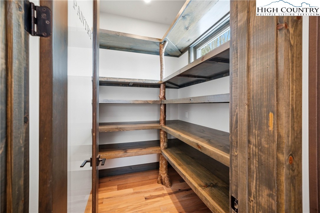 Lot 41 Mossy Creek Boone, NC 28607 - Photo 14 of 49 a view of walk in closet with empty racks