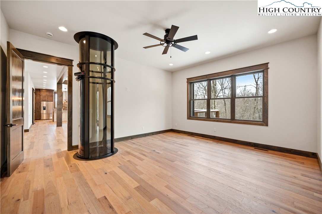 Lot 41 Mossy Creek Boone, NC 28607 - Photo 18 of 49 a view of livingroom with hardwood floor and a ceiling fan
