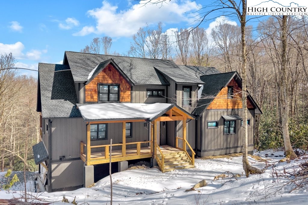 Lot 41 Mossy Creek Boone, NC 28607 - Photo 2 of 49 a front view of a house with a yard