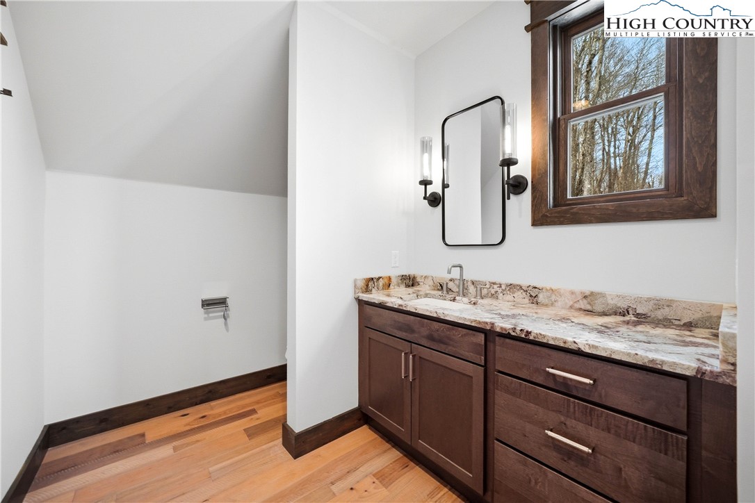 Lot 41 Mossy Creek Boone, NC 28607 - Photo 38 of 49 a bathroom with a sink and a mirror